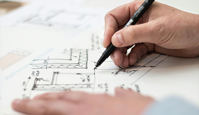 Architect drawing building design sketch